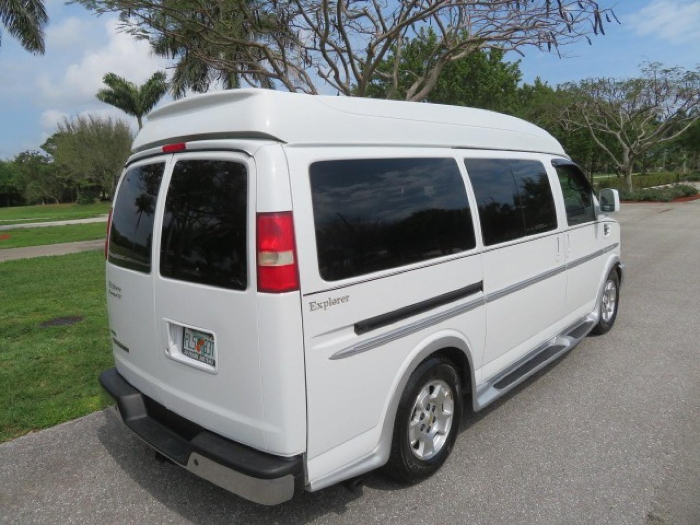 2010 White /Gray Chevrolet Express (1GNUGCD48A1) , located at 4301 Oak Circle #19, Boca Raton, FL, 33431, (954) 561-2499, 26.388861, -80.084038 - You are looking at a Gorgeous 2010 Chevy Express Handicap Wheelchair Conversion Van Explorer Limited SE with 31K Original Miles, Braun Century 750lb Side Entry Wheelchair lift, Tie Down System in the Floor, Rear Entertainment with Flat Screen TV/DVD, Leather Interior, Rear Power Folding Bench Seat/b - Photo#26